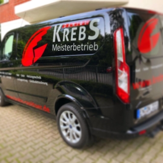 Fahrzeugbeschriftung KREBS Sanitär in Wuppertal.